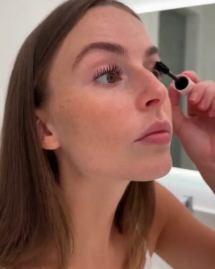 A mascara application close-up.